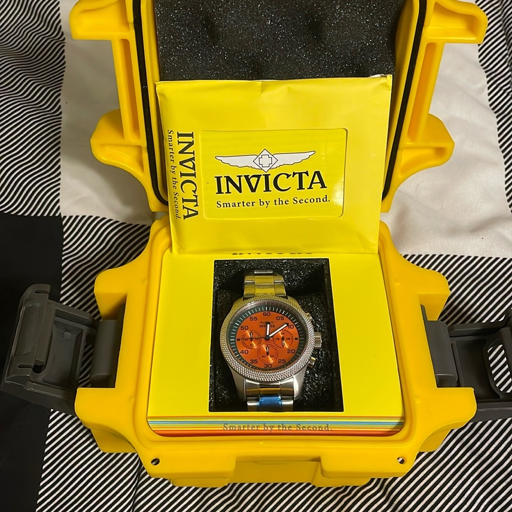 Men’s Invicta watch with stainless band